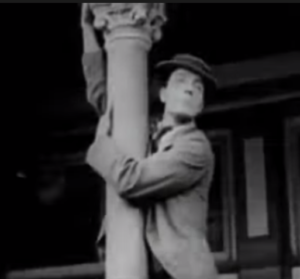 Coney Island - Buster Keaton climbing a street lamp